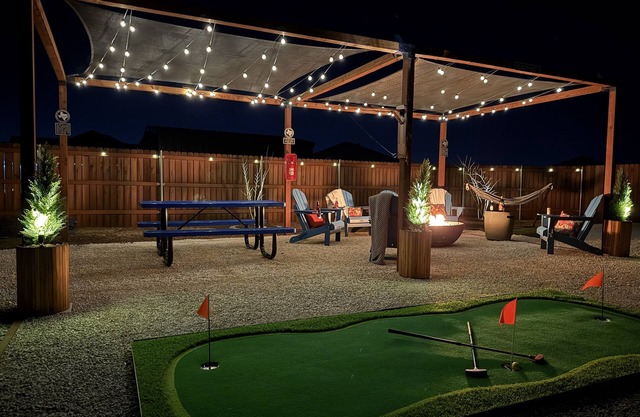 Abilene's Ultimate Backyard Getaway: Putt-Putt, Fire Pits, & Giant Games Galore!