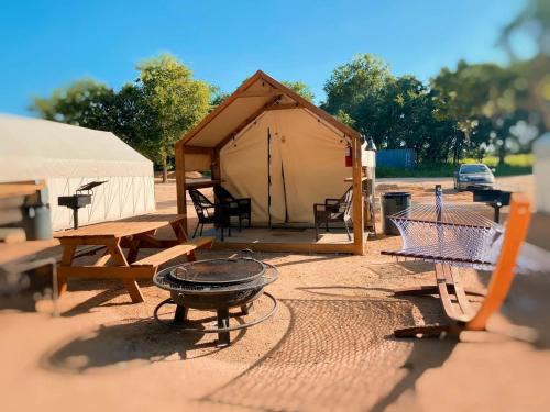 Adventurous Family Glamping Getaway: Amazing Safari Tent on the San Marcos River near Kingsbury, Texas with Kayaks, Canoes and More