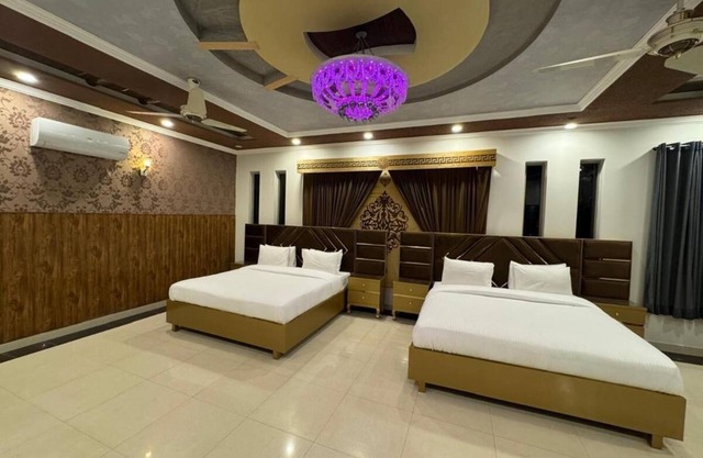 AK Lodges Islamabad: Exquisite 6-Bedroom Estate with Premium Finishes and AC
