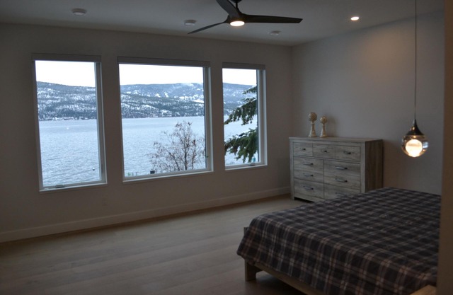 Amazing private lakeside home with beach and private dock