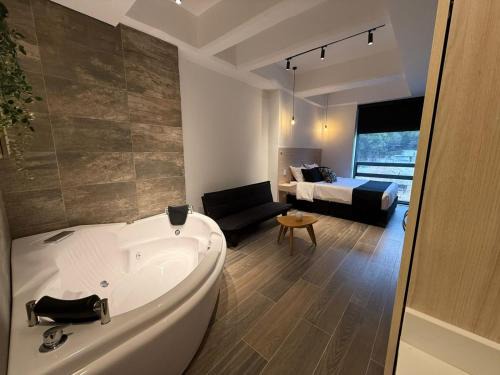 - Apartamento con Jacuzzi Privado y Cama Queen -