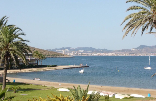 Apartment overlooking the sea with private lawn