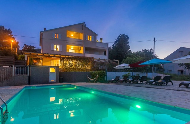 Apartment CLAIRE with large heated pool 50m2 and sea view