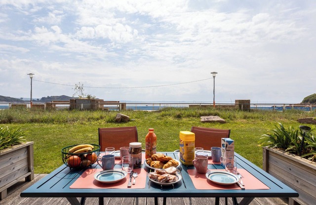 Apartment 'Les Pieds Dans L'eau' with Sea View, Private Terrace, and Wi-Fi