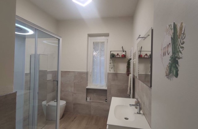 Appartamento in villa con veranda e giardino, relax e comfort garantiti