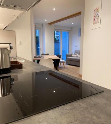 Appartement neuf et cozy avec place de parking