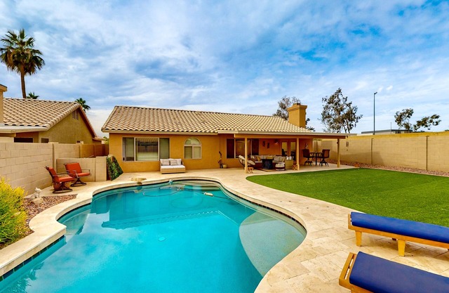 Attractive home with private pool, covered patio, firepit, AC, & private W/D