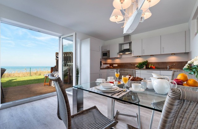 Baltic Sea vacation apartment "Schleiperle" - with water view, sauna and two terraces