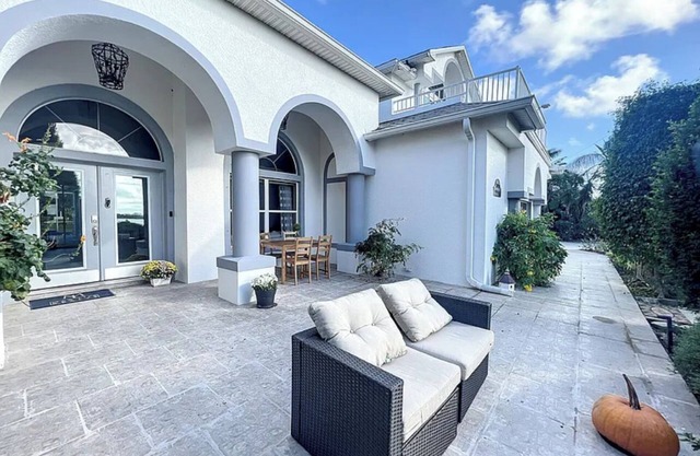 Barrier island water front luxury villa w dock near beaches and Disney Orlando