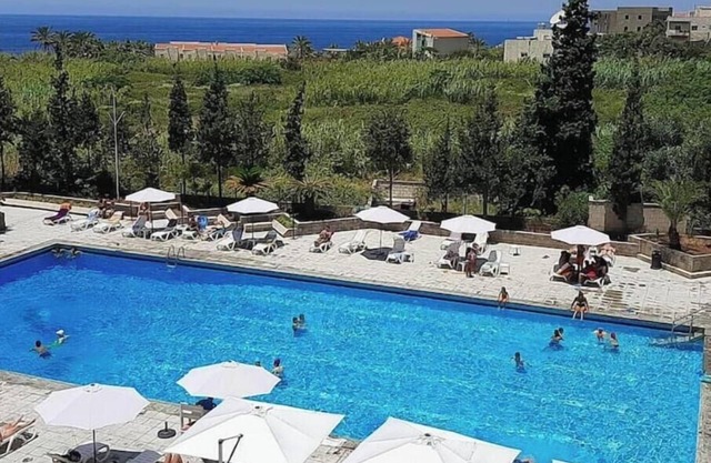 Beach apartment with Pool and direct beach access