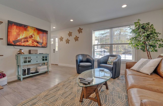 Beach Retreat. Private back yard with fire pit and large deck