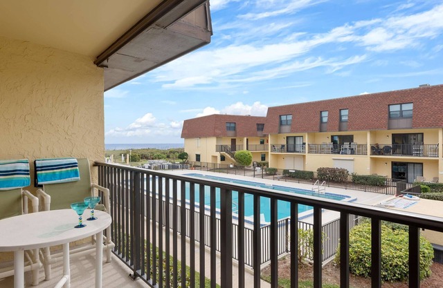 Beachfront 2BR Condo with Pool BBQ & Steps To Beach!