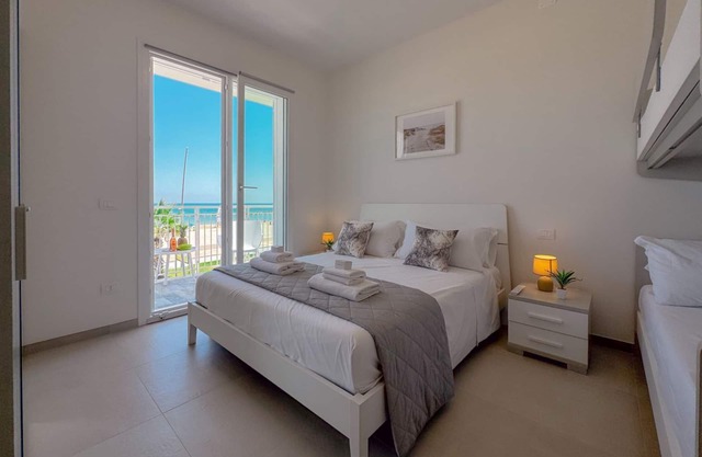 Beachfront apartment + car