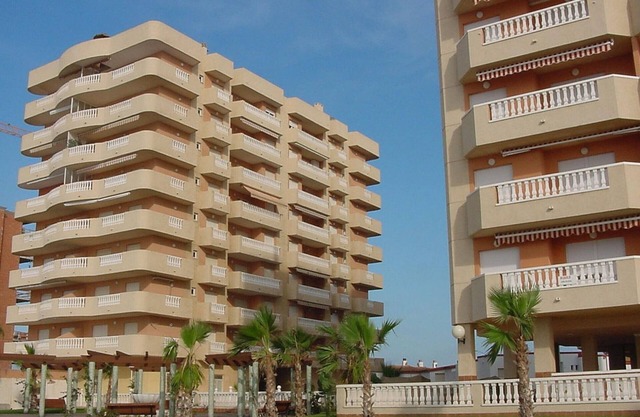 Beachfront Apartment with Pool, 2 Bedrooms, Terrace, and Parking