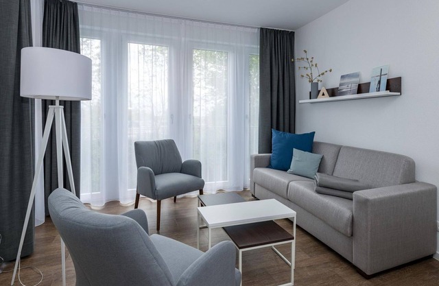 Beachfront apartment with large balcony, parking, use of swimming pool & sauna -