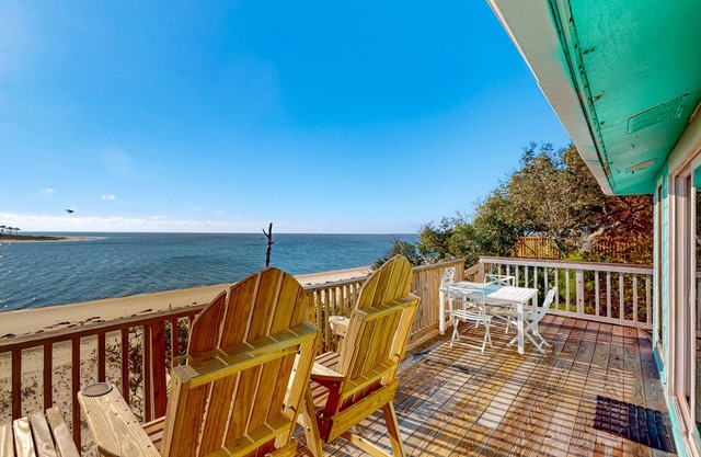 Beachfront dune cottage with deck & view of St Vincent Island