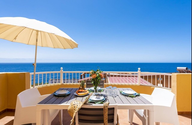 Beachfront triplex with swimming pool & parking