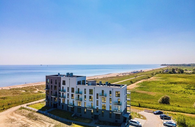 "BeachTerraceTwo" vacation apartment on the beach with sun terrace, sauna & sea view