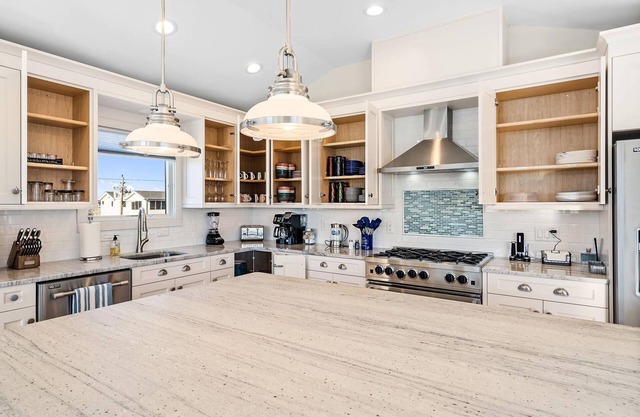 Beautiful 5 Bedroom beach block with swimming pool, decks, indoor/outdoor living