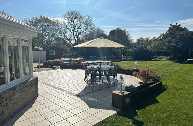 Beautiful five bedroomed family home in Guernsey with heated pool