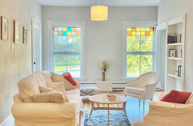 Beautiful, sunny retreat high over river and rail trail