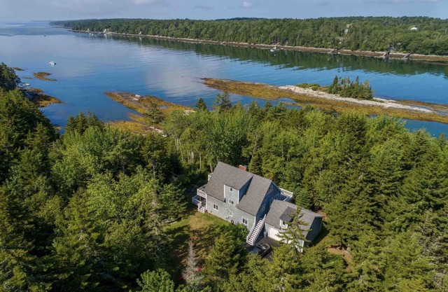 Beautiful waterfront home, multiple decks, expansive views, private dock, large yard, and more!