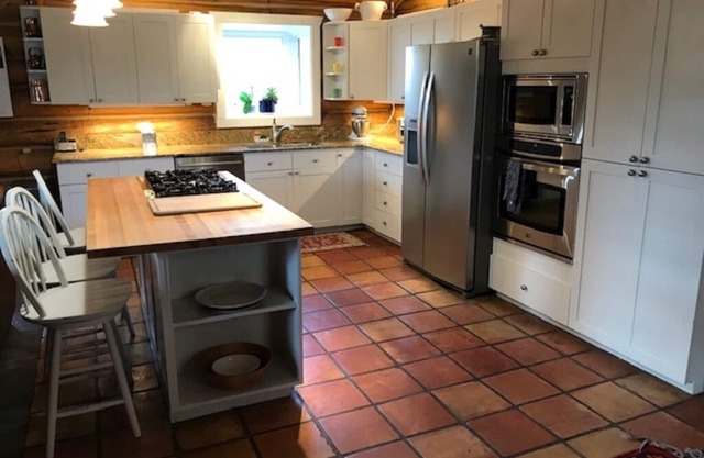 Beautiful, well-appointed, log cabin home with gracious spaces and lots of light