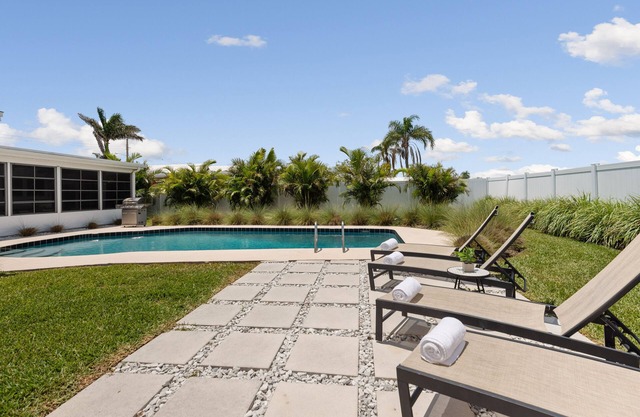 Beautifully renovated pool home - walking distance to the beach