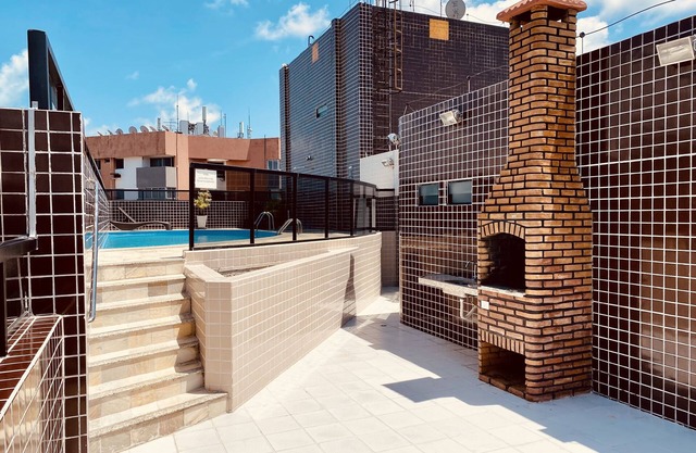 Bedroom and living room with pool near the beach