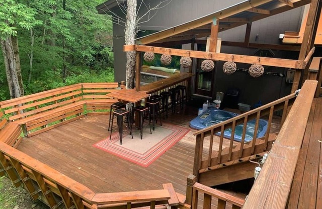 Best of both worlds; chalet located on a private lot in the woods and only 3 miles from the village!