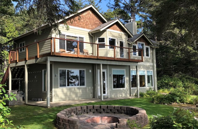 Breathtaking Beachfront Home on Two Acres of Private Forest