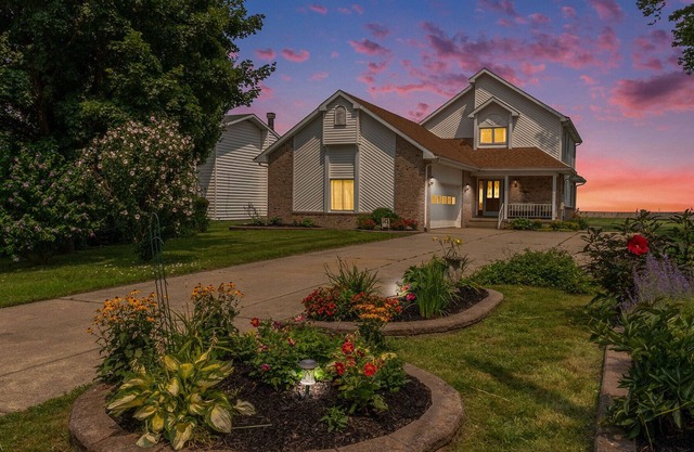 BREATHTAKING LAKEFRONT HOME WITH PANORAMIC VIEWS OF LAKE ERIE! ALL GLASS SUNROOM