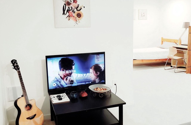 Bright basement suite by Event Centre with 2 bed,private entrance & free parking