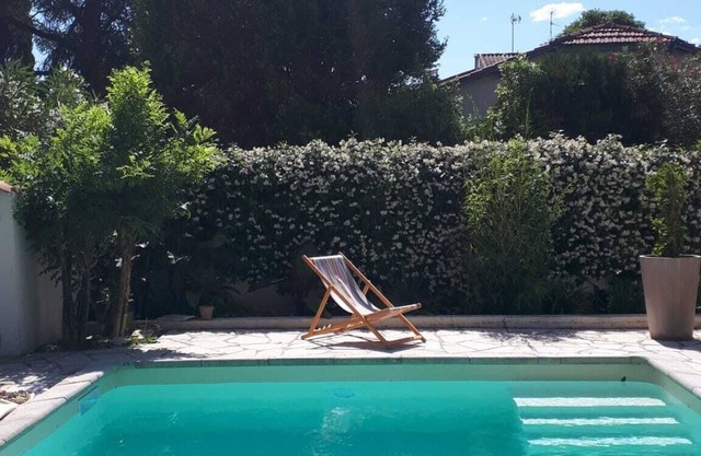 bright house with swimming pool