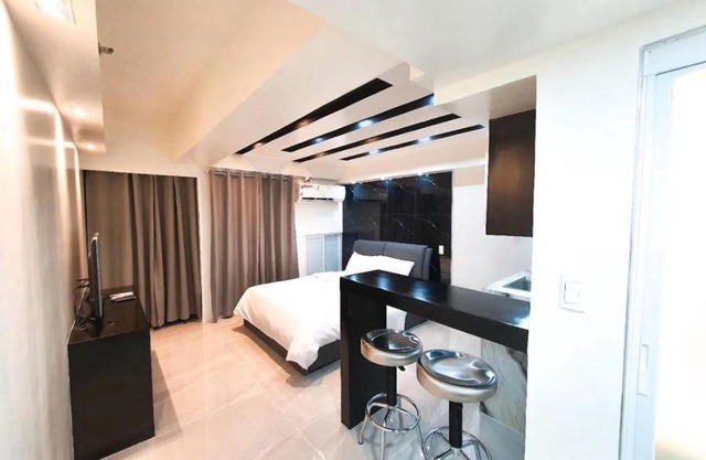 Burgundy McKinley Place Service Apartment