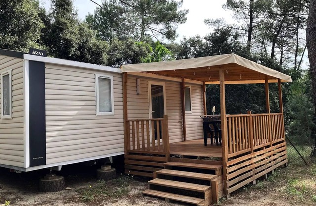 Campsite La Simioune in Provence * - Mobile home Air-conditioned PROVENCE -2 bedrooms + TV (2 adults + 2 children) 2 to 4 people - 2 pers. included in the tariff