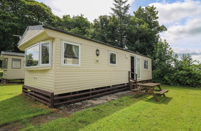 CARAVAN 2 AT BLACKMOOR FARM, pet friendly, with a garden in Tenby
