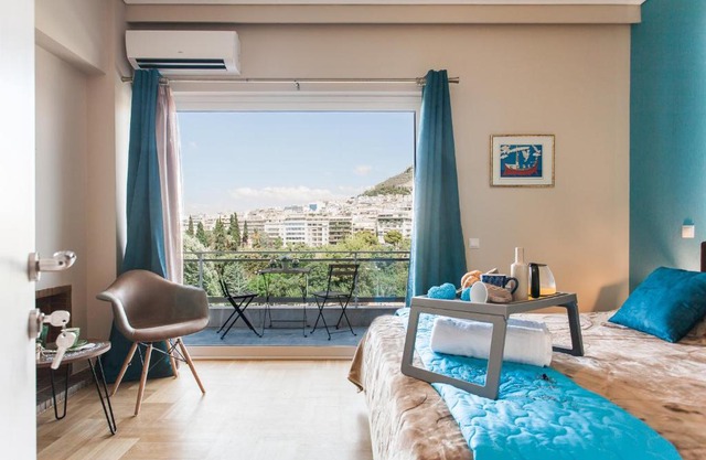 Central high-class and safe rooms next to Metro Airport Line with Acropolis View from balcony