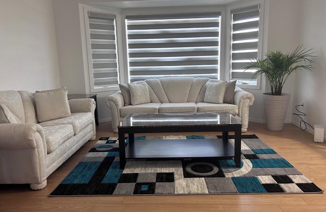 Centrally located in Kelowna with big back yard.