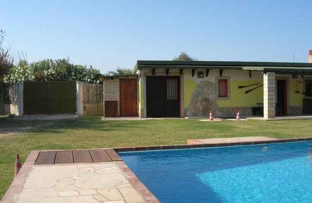 Chalet with private pool with direct beach access