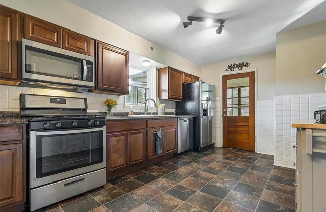 Charming 2-bedroom house in lovely Florissant with AC, has lots of light.