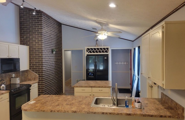 Charming 3-bedroom house secluded on 2 acers, but close to everything.