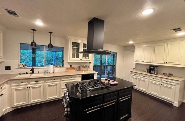 Charming 4-bedroom house with a fenced backyard for the pup.