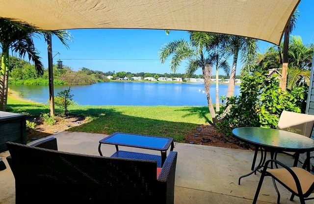 Charming 55+ community. Waterfront! Fantastic sunset views & private hot tub