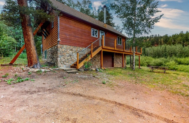 Charming A-frame cabin next to stream on 3 acres