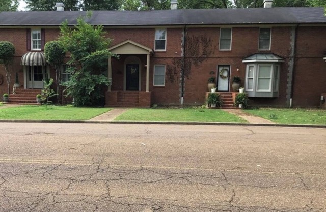 Charming condo 3-bedroom 2 bath, 2 living rooms! Stocked kitchen, laundry room