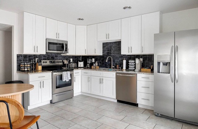 Charming Designer 3-bedroom home in The Colony w/Game Room, Pool, Grill + More!