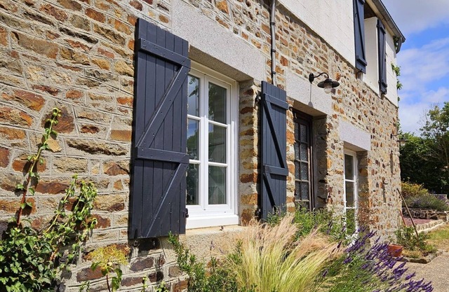 Charming four bedroom house with acres of garden and pool in rural Normandy