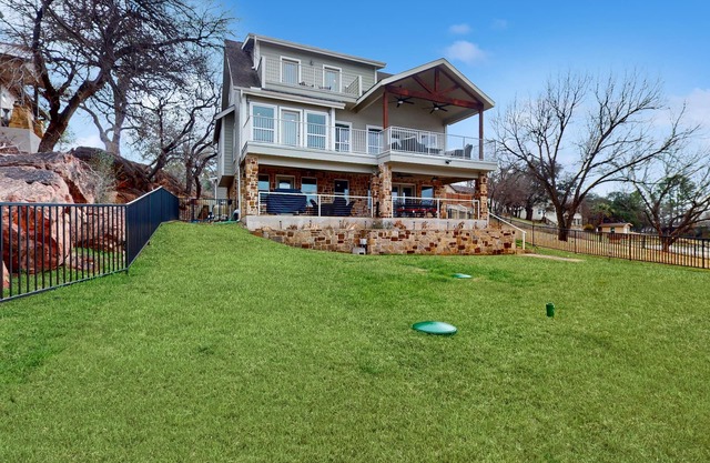 Charming lakefront home with lake views, dock & entertainment