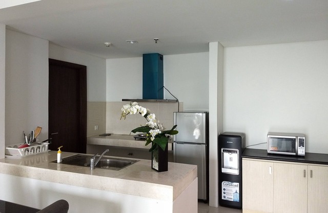 Charming Minimalist 3 Bedroom Apartment in St Moritz Puri Indah